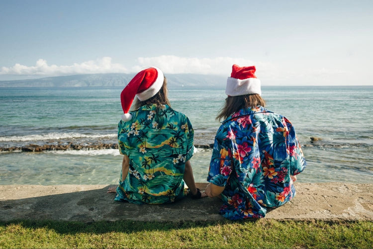 Two friends enjoying Christmas with Christmas design Hawaiian shirt