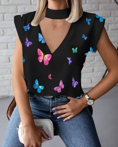 Island escape in color: Embrace paradise with a colorful butterfly print Hawaiian top.