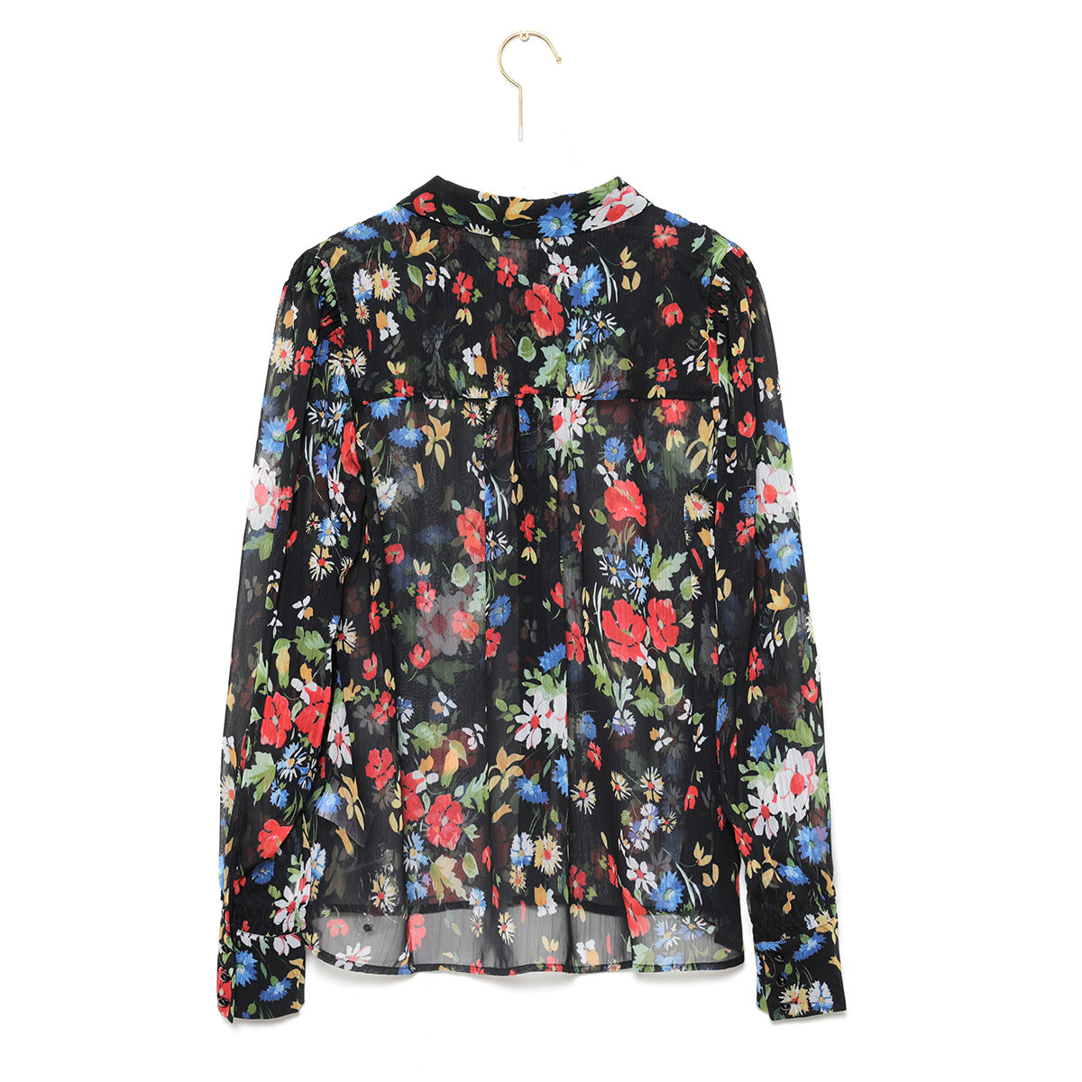 Garden to beach paradise: Transport yourself to paradise with a colorful floral beach shirt.