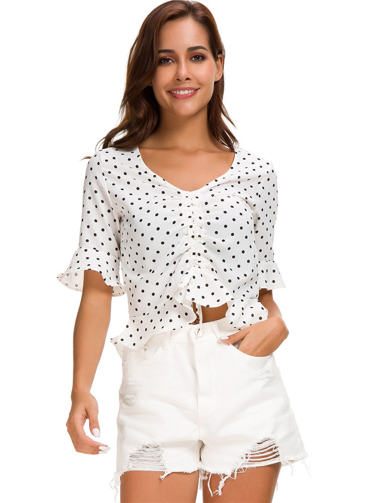 Summer vibes and sunshine dots: This Hawaiian shirt adds a touch of fun with a classic polka dot print. 