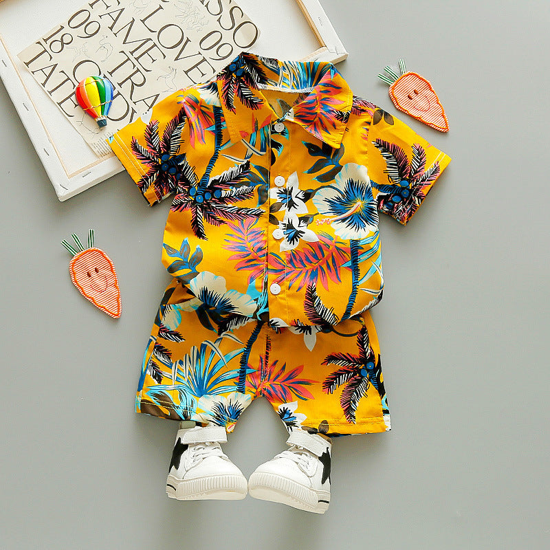 Three-piece summer set for children featuring a floral print shirt, a lightweight cardigan, and coordinating beach shorts.     tune  share   more_vert