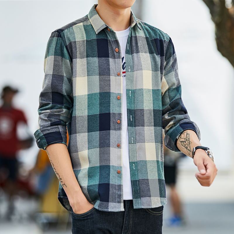 Relaxed Comfort, Classic Style: Men's Loose Fit Long Sleeve Plaid Shirt. Enjoy all-day comfort in this plaid shirt with a casual, loose fit.