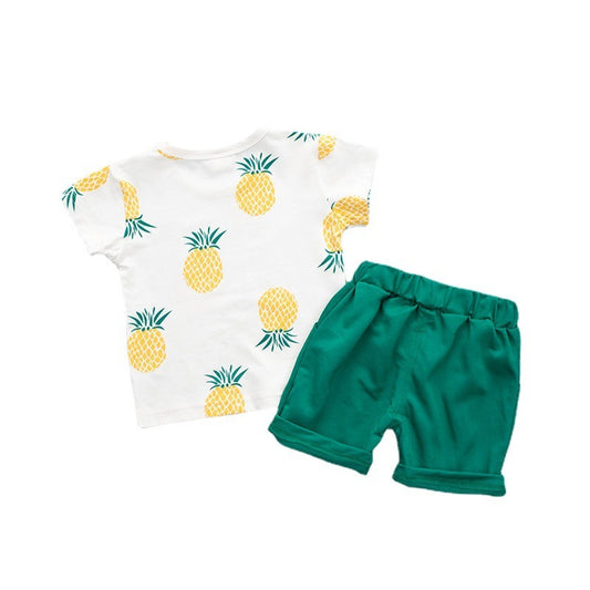 Two-piece summer clothing set for children featuring a short-sleeve t-shirt with a pineapple print and coordinating shorts.
