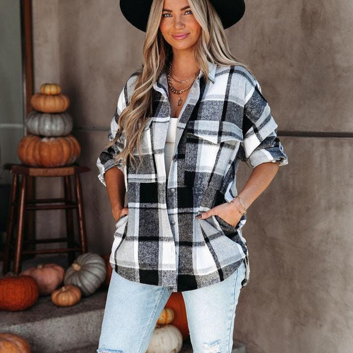 Effortless Breezes, Plaid Vibes: Loose-fitting plaid shirt keeps you cool and stylish by the shore.