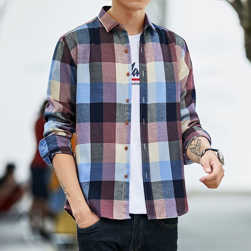 Plaid with Ease: Men's Loose Fit Long Sleeve Plaid Shirt. Move freely in comfort and style with this relaxed-fit, long-sleeve plaid shirt. 
