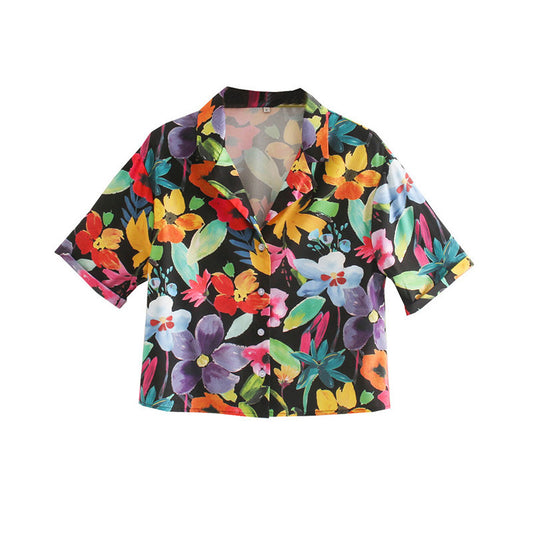 Island ready: Woman in a short-sleeve floral Hawaiian shirt, perfect for the beach.