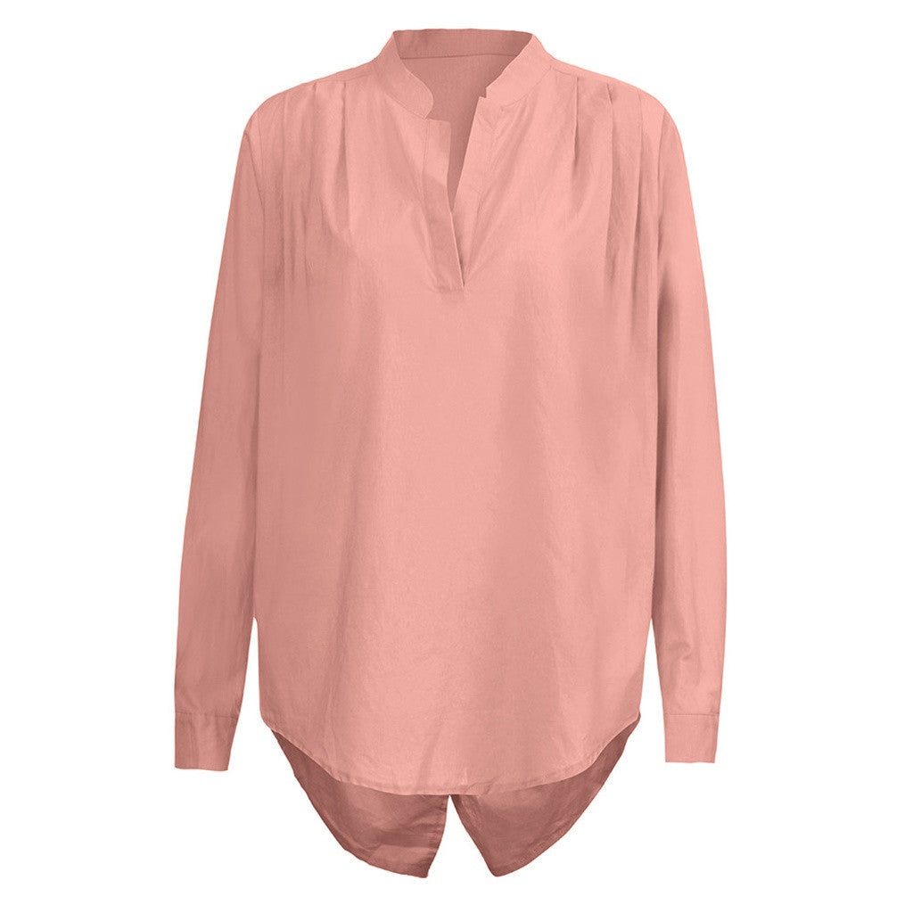 Effortless elegance, beach-ready: V-neck long sleeve shirt offers casual comfort for the beach.