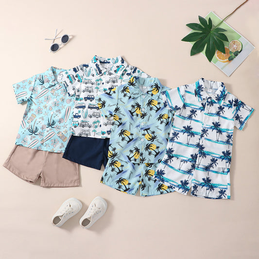 Two-piece Hawaiian-style outfit for boys featuring a short-sleeve shirt with a tropical print and coordinating pants.