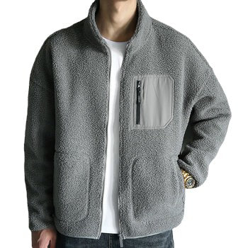 Front view of a cozy grey winter jacket with velvet padding