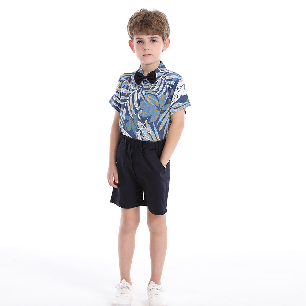 Boy's summer outfit: printed shirt and shorts set.