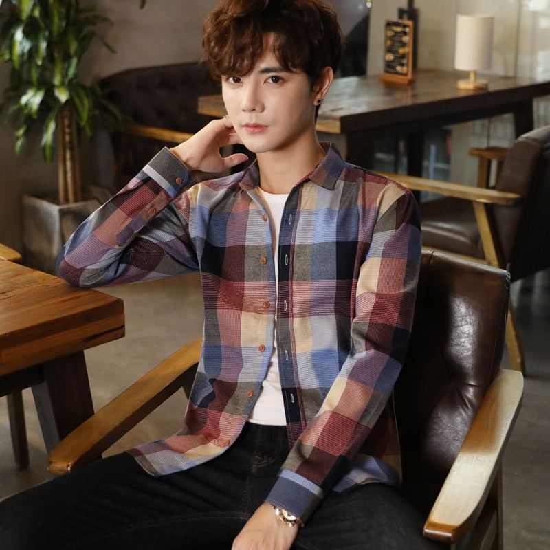 Classic Plaid Style: Men's Loose Fit Long Sleeve Plaid Shirt. A timeless plaid pattern meets relaxed comfort in this long-sleeve shirt. 