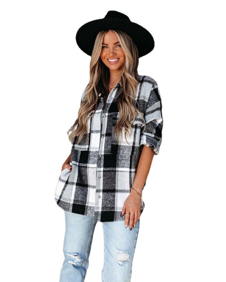 Beach Chic with a Plaid Twist: Plaid pattern adds a touch of timeless style to this comfy beach shirt.