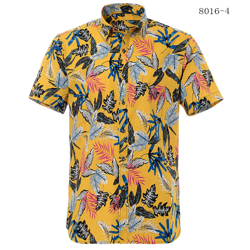 Yellow colour men's beach shirt adorned with tropical leaf print, short sleeve