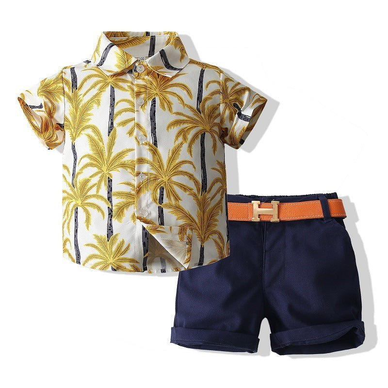 Bright colored boys' Hawaiian shirt and shorts set, perfect for summer adventures. 