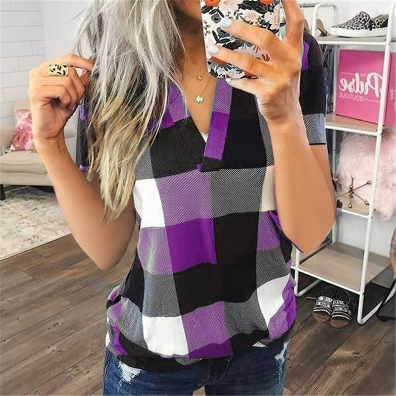 V-neck vibes, plaid style: Breezy comfort meets classic plaid in this beach shirt.