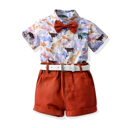 Brand new children's clothing set featuring a short-sleeve shirt with a dinosaur design and matching belted shorts.