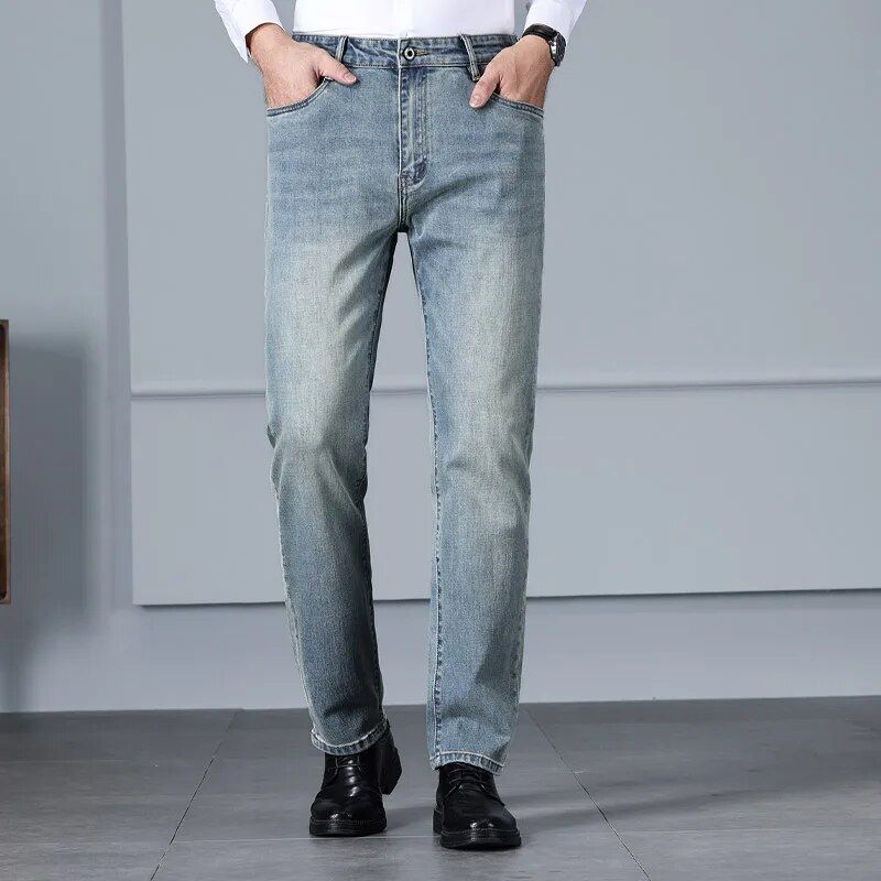 Comfortable high waist elastic jeans for men, crafted from cotton blend, perfect for casual autumn wear