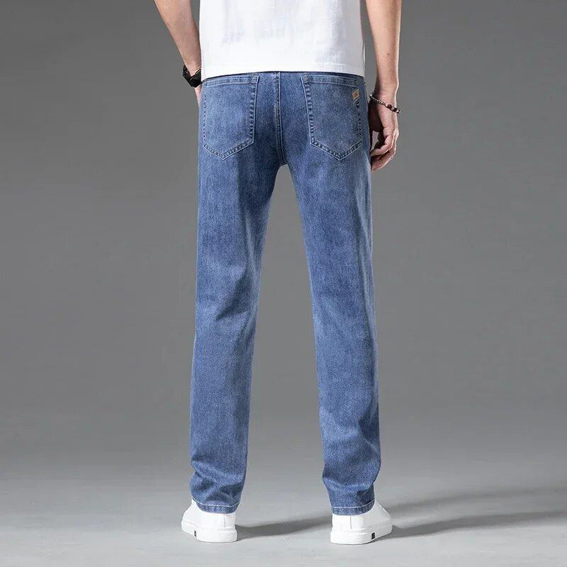 Men's denim jeans designed for spring and summer, featuring lightweight stretch