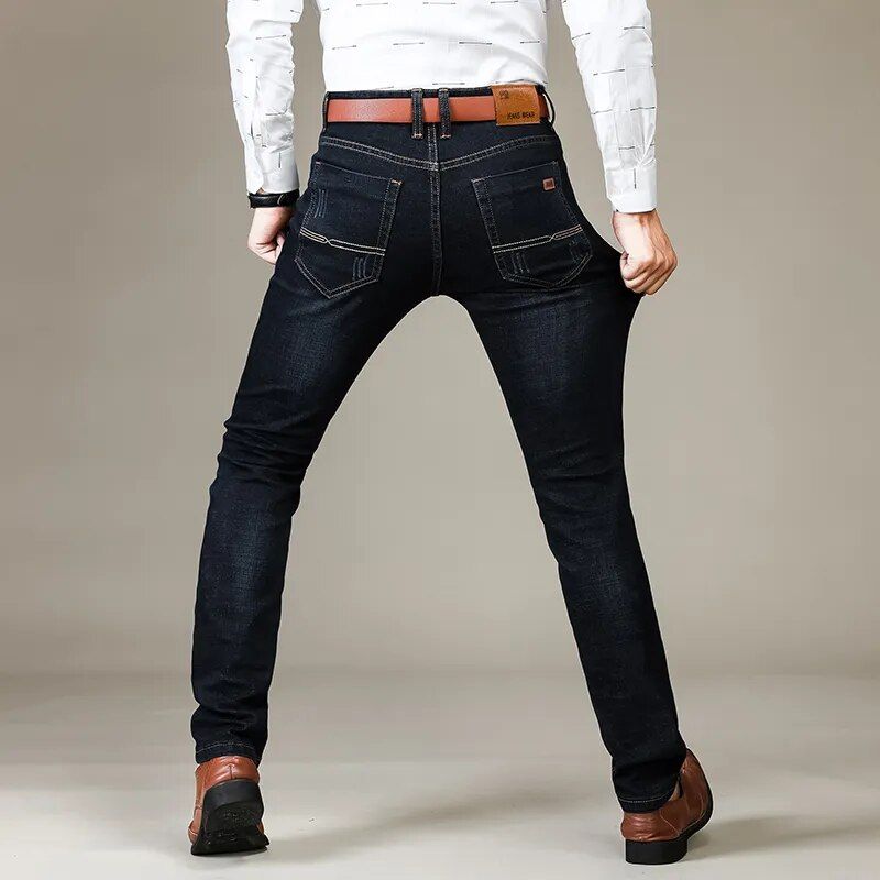 Classic straight leg denim jeans for men, designed for versatile wear from casual to business attire.