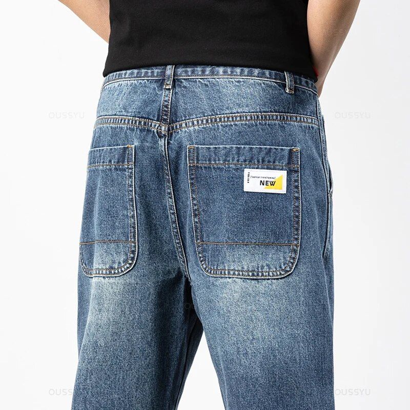 Stylish men's denim pants with a retro ankle-length design, made from blue cotton
