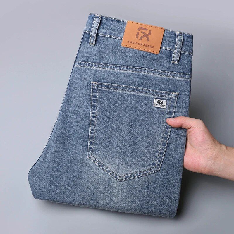 Men's summer jeans in a relaxed light blue, ideal for laid-back occasions