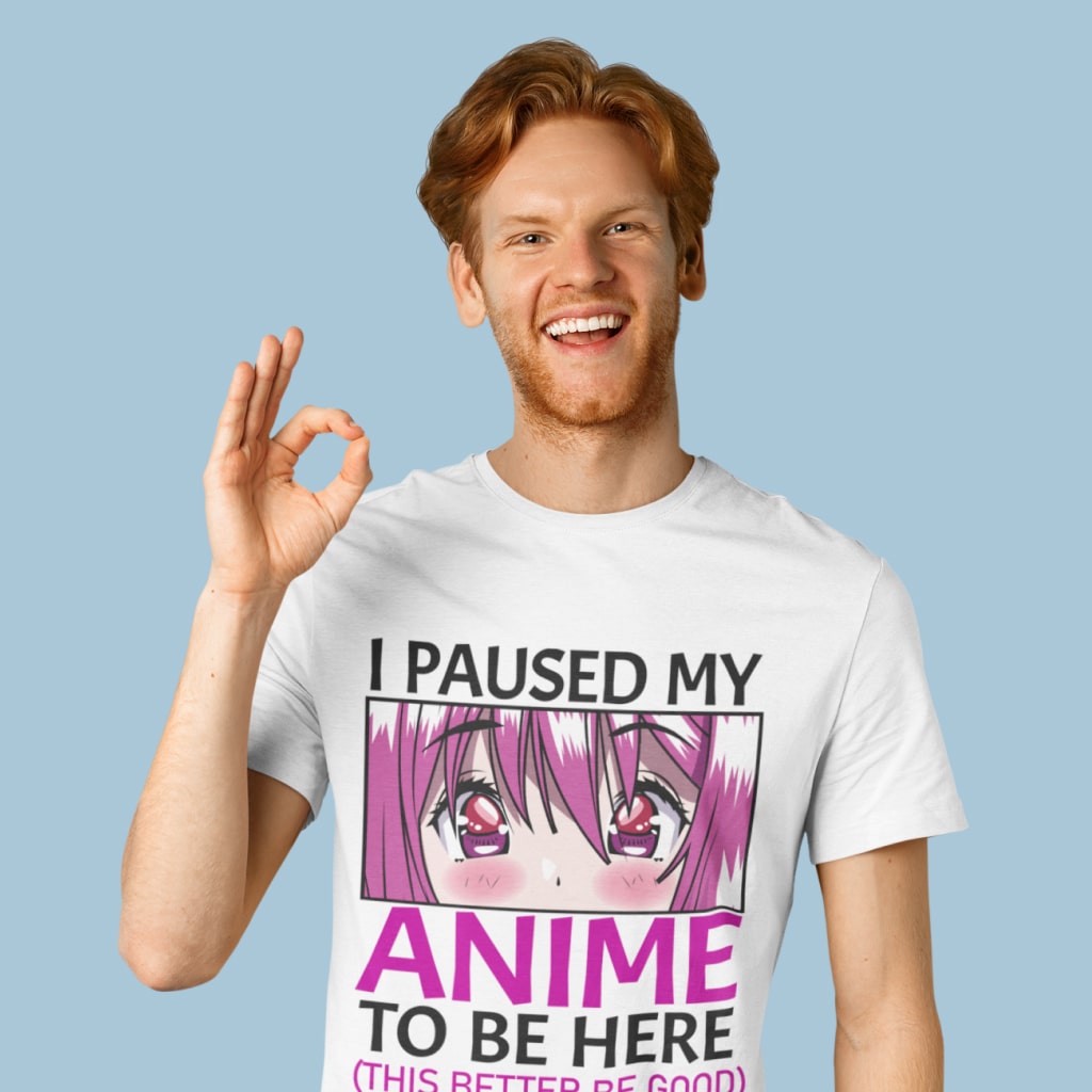 A happy young men from America wears a I Paused My Anime To Be Here T-Shirt - Otaku Anime Merch