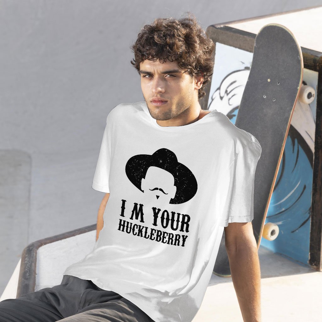 A young men from America wears a I'm Your Huckleberry T-shirt