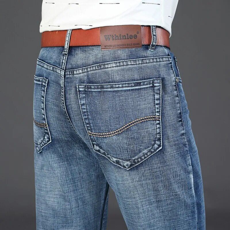 Stretch denim jeans tailored for men's business fashion, boasting a straight fit
