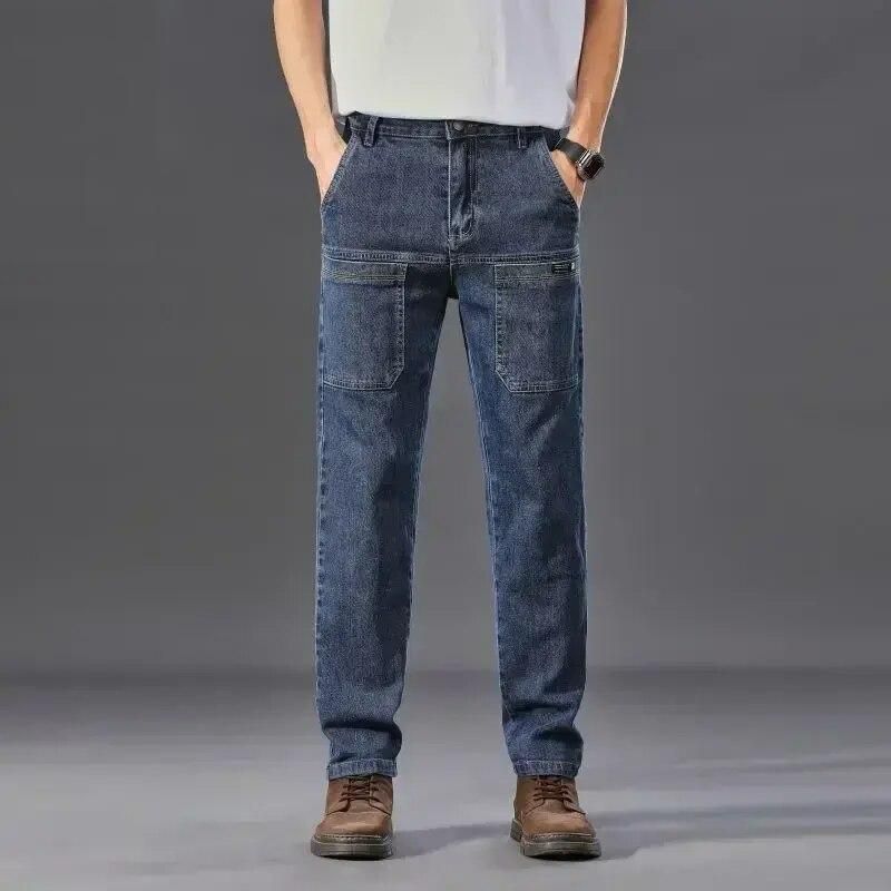 Stylish men's slim fit cargo jeans featuring trendy six-pocket design, perfect for work
