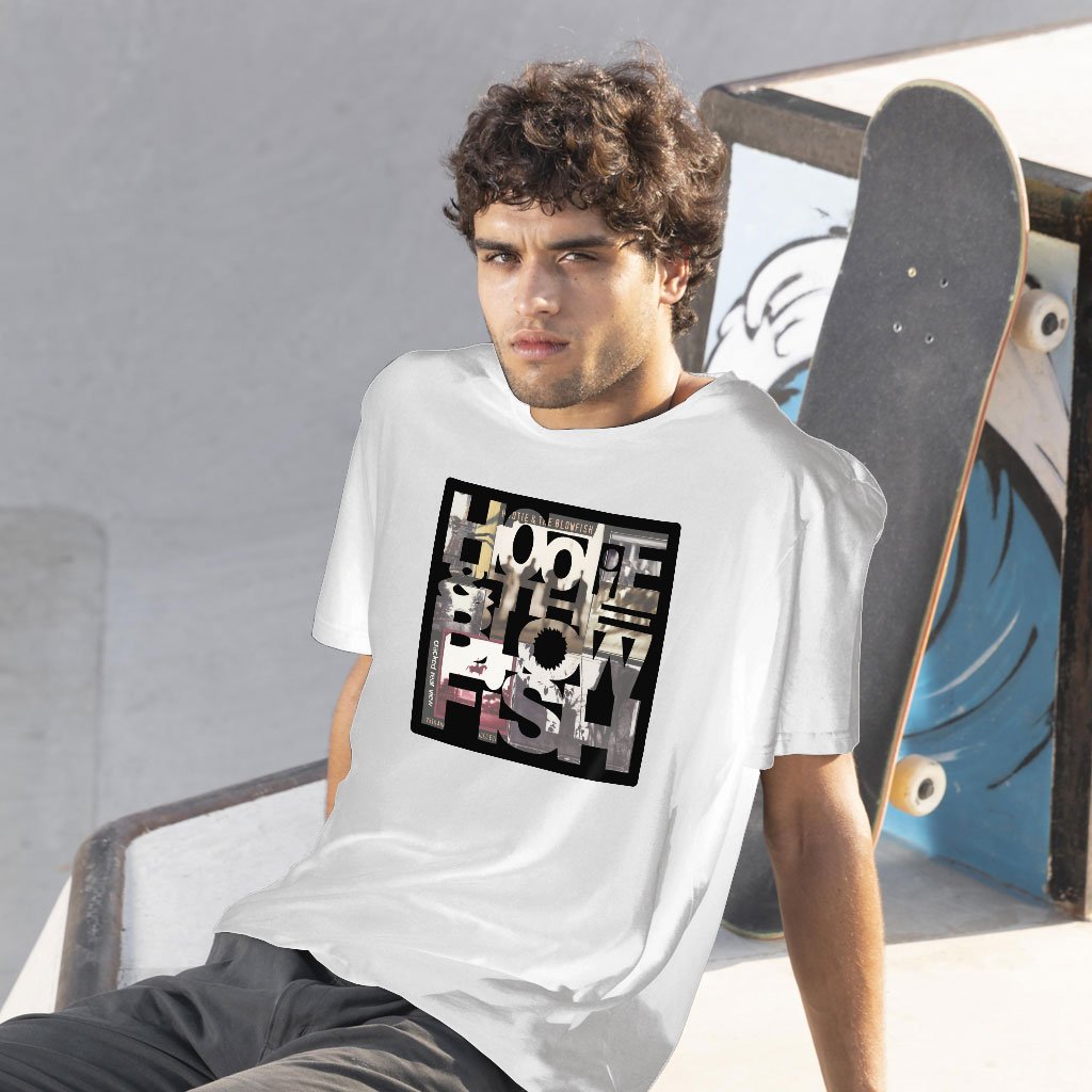 A young man from America is wearing a t-shirt with the logo of the band Hootie and the Blowfish on it