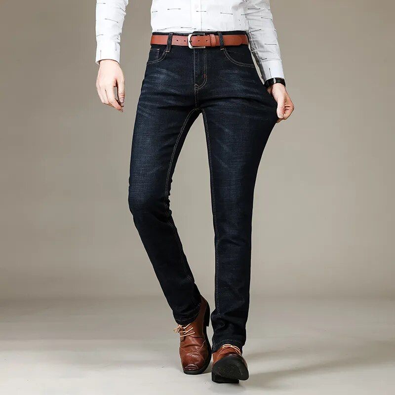 Men's denim jeans with classic straight leg and stretch, perfect for transitioning from casual to business attire