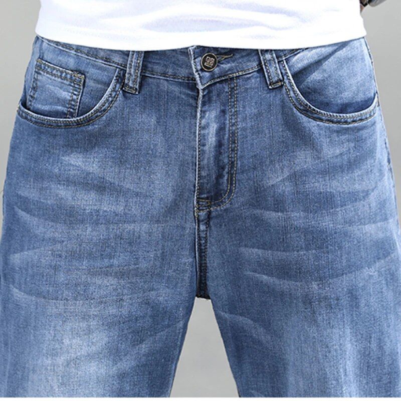 Summer-ready men's denim jeans with a loose straight cut