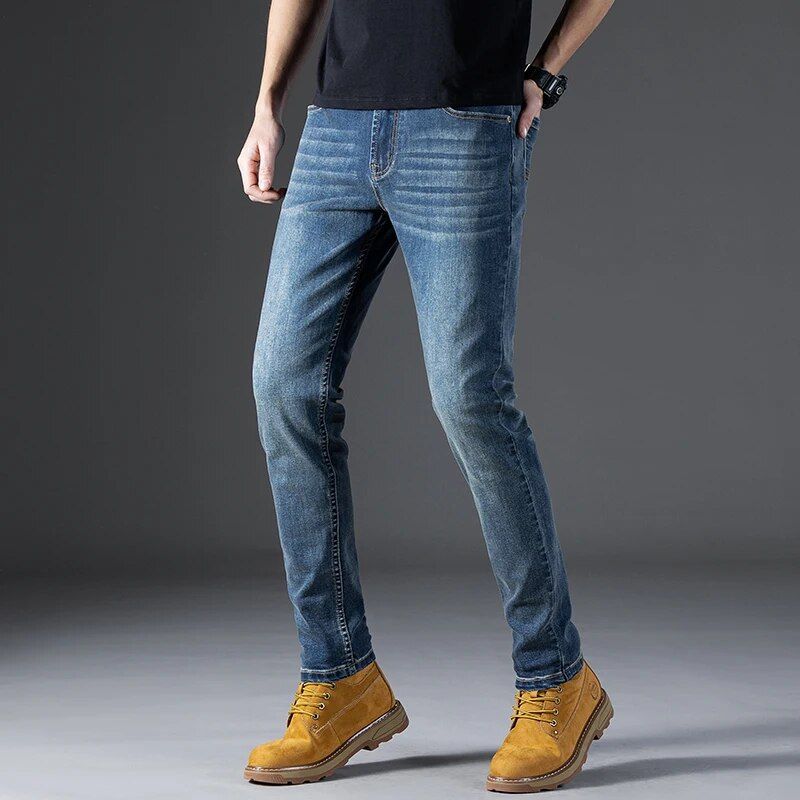 Business style men's jeans with regular fit and stretch, offering versatility for casual occasions.