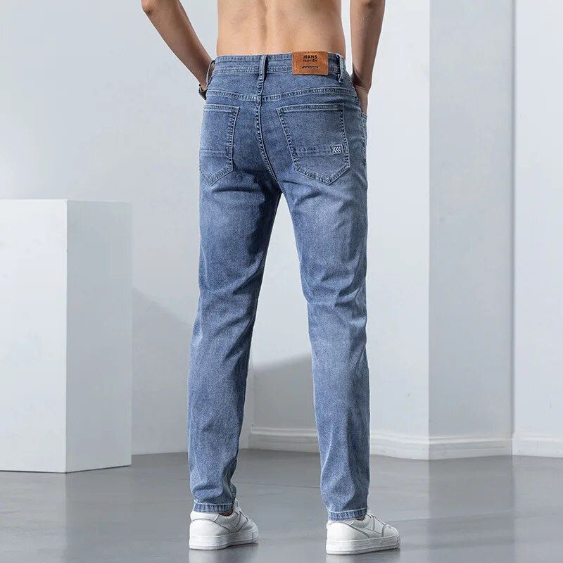 Slim fit men's skinny jeans with stretch, designed for business fashion style in summer and spring