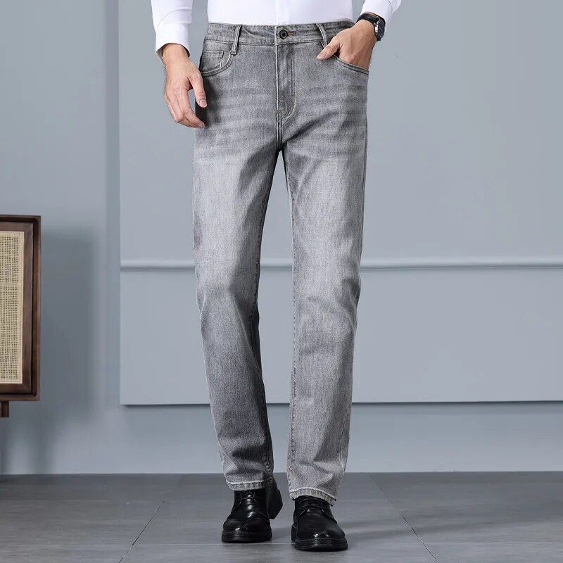 Men's high waist cotton blend elastic jeans, offering casual comfort for the autumn edition
